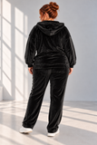 Tuta nera in velluto con strass.png